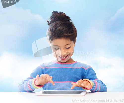Image of happy little girl with tablet pc computer