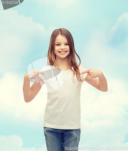 Image of smiling little girl in blank white t-shirt