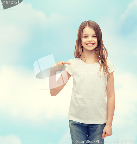 Image of smiling little girl in blank white t-shirt