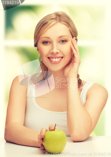 Image of woman with green apple