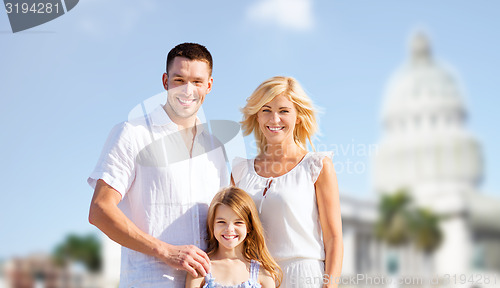 Image of happy family over american white house background