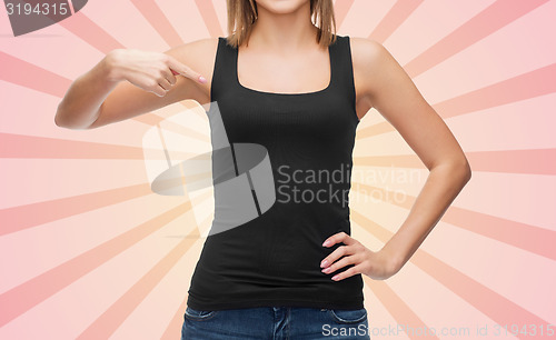 Image of close up of woman in blank black tank top