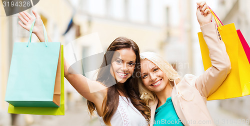 Image of girls with shopping bags in ctiy