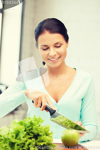 Image of beautiful woman in the kitchen