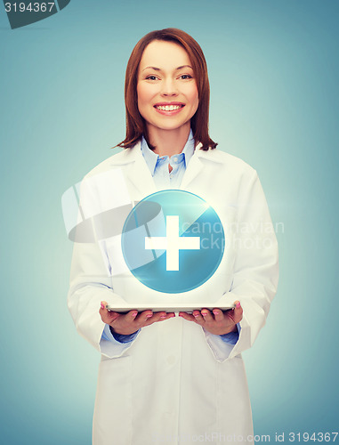 Image of smiling female doctor and tablet pc computer