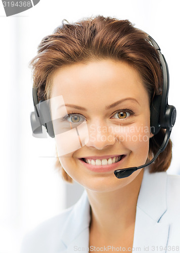 Image of friendly female helpline operator