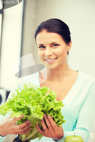 Image of beautiful woman in the kitchen