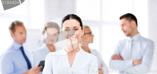 Image of businesswoman in office