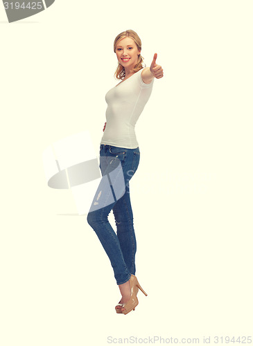 Image of woman in blank white t-shirt with thumbs up