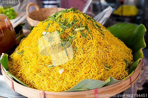 Image of cooked noodles at street market