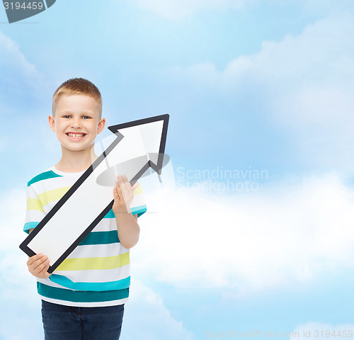 Image of smiling little boy with blank arrow pointing right