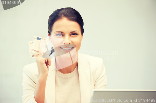 Image of lovely woman with euro cash money