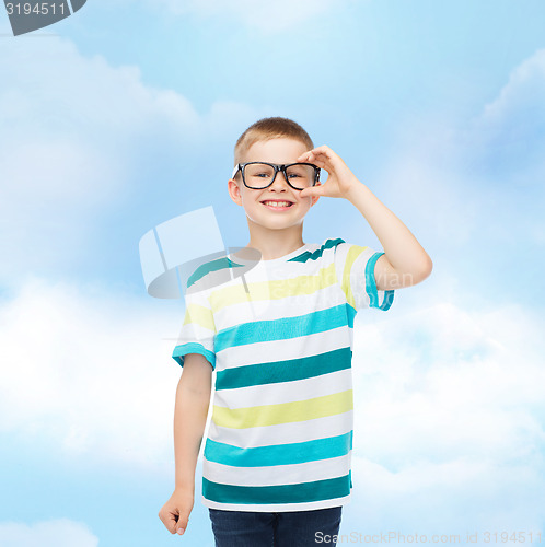 Image of smiling little boy in eyeglasses