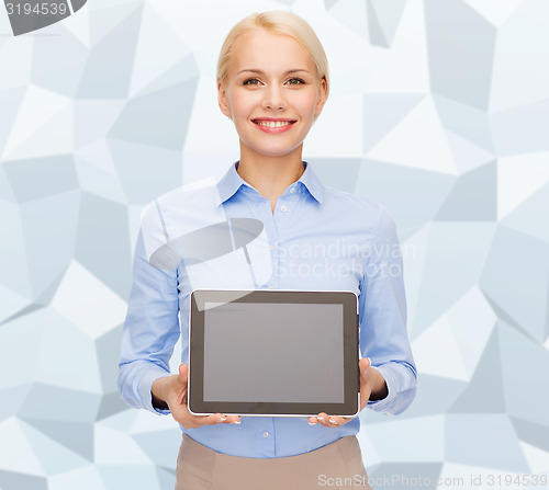 Image of businesswoman with blank black tablet pc screen