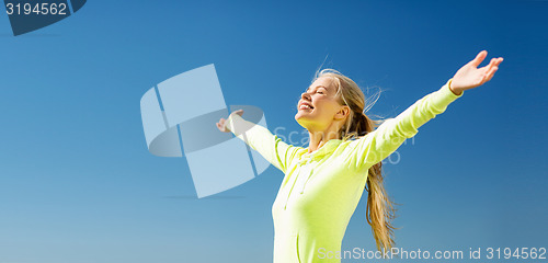 Image of woman doing sports outdoors