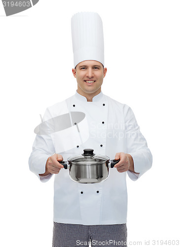 Image of happy male chef cook holding pot