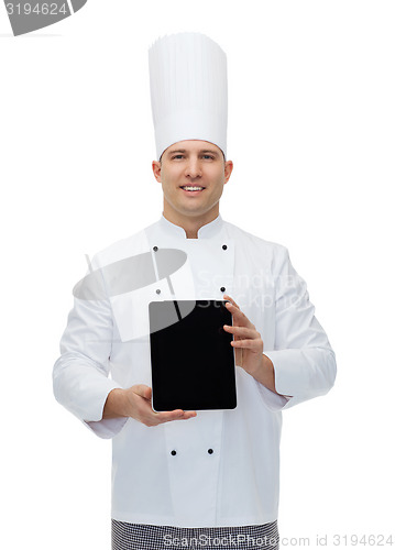 Image of happy male chef cook showing with tablet pc