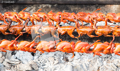 Image of quail grill on street market