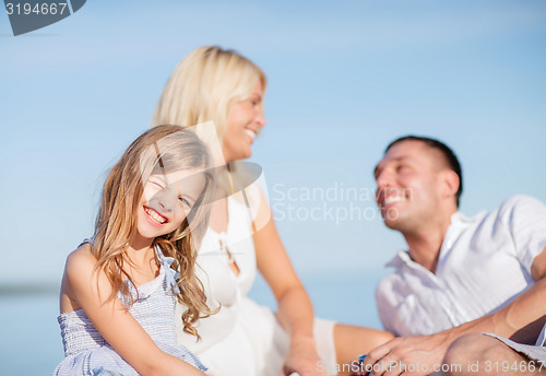 Image of happy family having a picnic