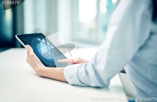 Image of close up of woman hands with tablet pc at office