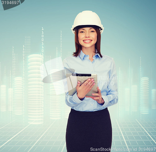 Image of young smiling businesswoman in white helmet