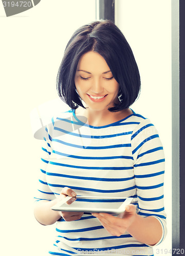 Image of happy teenage girl with tablet pc computer