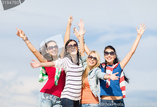 Image of beautiful teenage girls or young women having fun