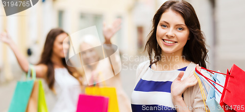 Image of girls with shopping bags in ctiy