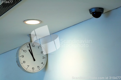Image of Clock and security camera