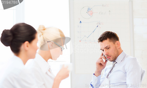 Image of stressed male boss on business meeting