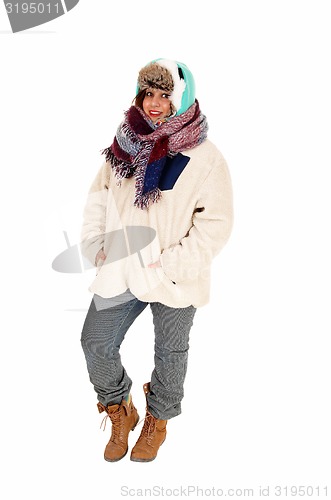 Image of Woman in coat and scarf.