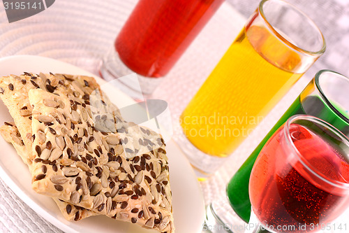 Image of sweet cake on white plate and juice