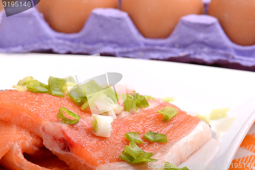Image of Slice of red fish salmon and eggs
