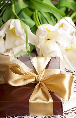 Image of  gift and white tulips