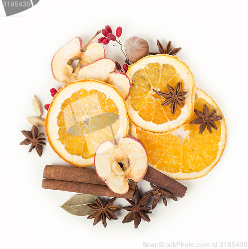 Image of Christmas spices and dried orange sliceson 