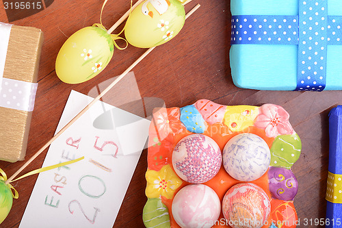 Image of Easter background with eggs and gift box