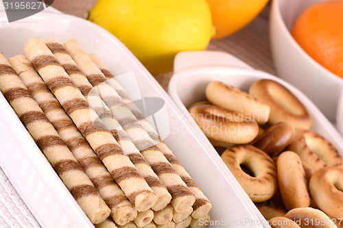 Image of sweet cake on white plate with lemon