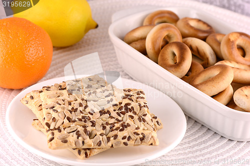 Image of sweet cake on white plate and fruits
