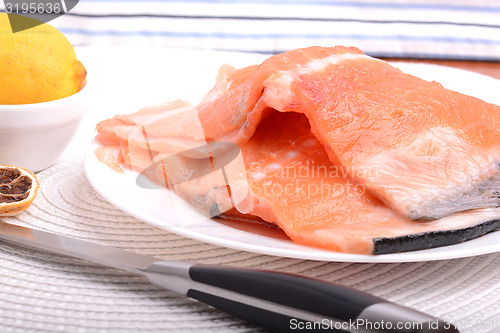 Image of Fresh uncooked red fish fillet slices