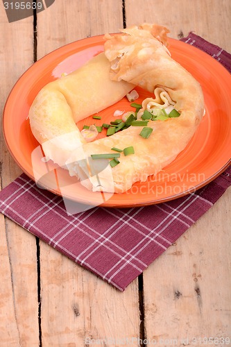 Image of cottage cheese and fresh chopped parsley