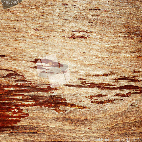 Image of cracked lacquered wooden board