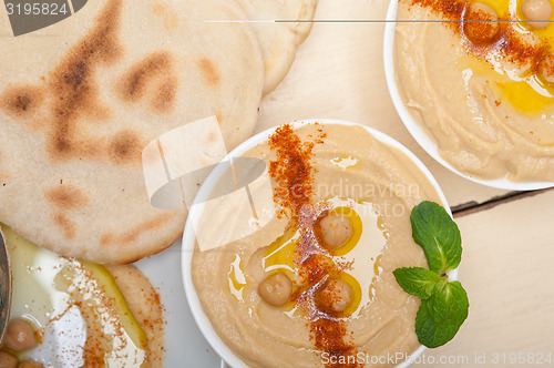 Image of Hummus with pita bread 