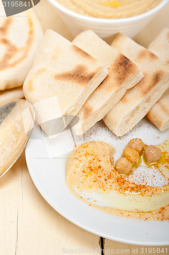 Image of Hummus with pita bread 