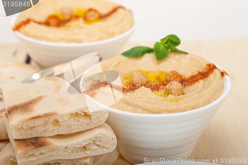 Image of Hummus with pita bread 