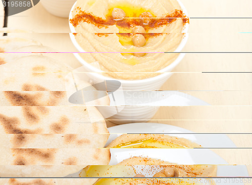 Image of Hummus with pita bread 