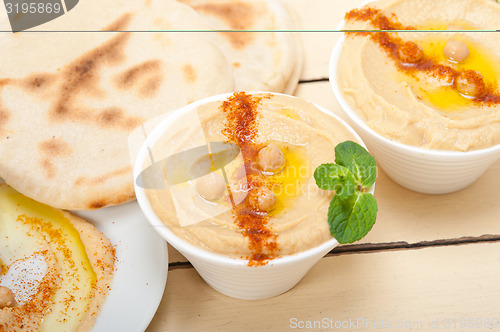 Image of Hummus with pita bread 