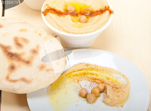 Image of Hummus with pita bread 