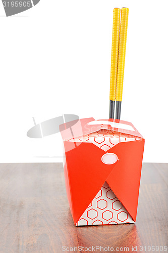 Image of Chinese take away red food box with chopstocks