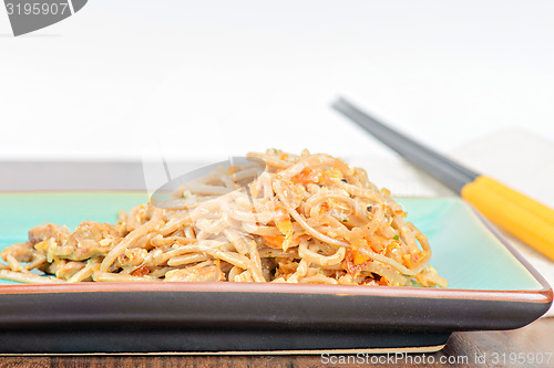 Image of China noodles with vegetables and meat