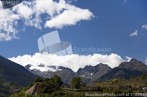 Image of Swiss Alps with clouds